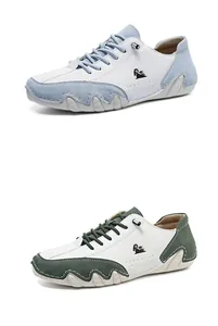 Detailed view of color-blocked casual shoes with octopus soles in blue and green