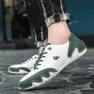 Men's casual low-top color-blocked sneakers with unique octopus-style white sole.