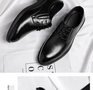 Close-up detail of premium black glossy men's leather wedding shoes featuring a soft sole