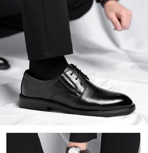 Side view detail of professional black leather men's dress shoes with lace-up design