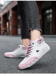 Detail of women's pink and white color-block high-top leather leisure boots