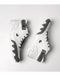 Top-down view of white and grey leather high-top sneakers with LDECK strap details