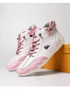Close-up detail showing the side profile of pink and white color-block high-top leather boots