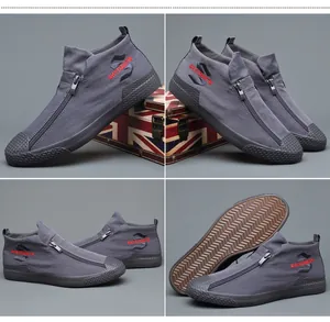 Vistas detalladas de zapatillas de lona grises de caña alta para hombre con cremallera frontal