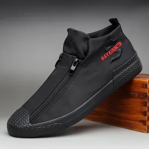 Zapatillas de lona negra para hombre con cremallera frontal y detalle bordado