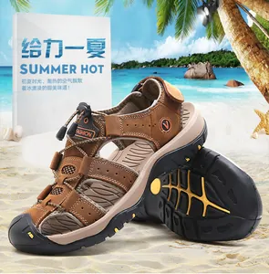 Detailed view of men's brown genuine leather beach sandals with durable anti-slip rubber soles