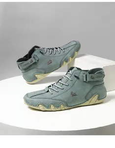 Detailed side view of teal high-top casual shoes featuring a unique wavy octopus sole