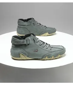 Detailed view of grey LDECK men's high-top casual boots featuring a unique octopus sole design