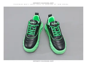 Stylish men's chunky bread sneakers in bold black and neon green with a thick sole