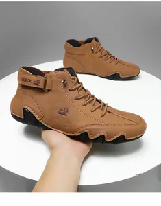 Close-up of brown high-top men's casual boots featuring a unique octopus-shaped sole.