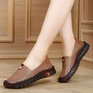 Comfortable brown leather flat shoes for women featuring soft and flexible soles