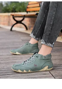 Detailed side view of green high-top casual boots with octopus-style soles