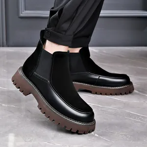 Bottines Chelsea en cuir noir pour homme avec semelles crantées marron au style urbain