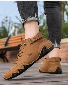 Side view of men's brown high-top casual boots with octopus-style anti-slip soles