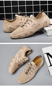 Detailweergaven van beige casual schoenen van mesh met ademend ontwerp en vetersluiting.