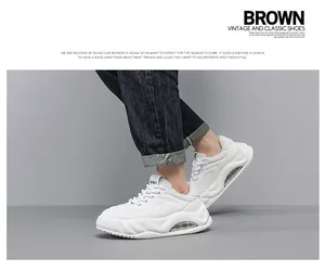 Stylish white chunky sneakers for men featuring a thick air cushion sole and casual design