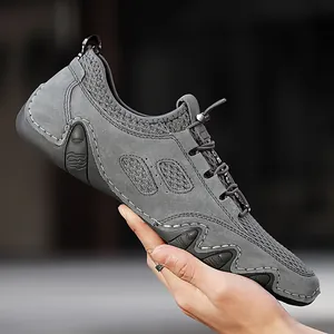 Ademende casual herensneakers van grijs varkensleer en mesh stof