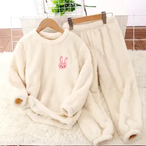 Ultra-soft cream fleece pajama set featuring a cute pink bunny embroidery detail.