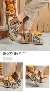 Detailed view of ethnic style totem linen high-top platform shoes in autumn setting.