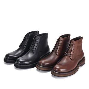 Detail view of genuine leather men's high-top lace-up boots in black and brown