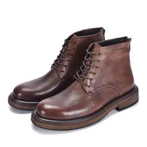 Close-up detail of men's retro brown leather Martin boots with thick soles and round toe