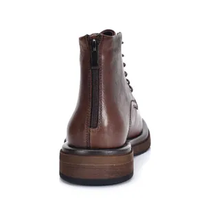 Classic men's brown leather Martin boots featuring rear zipper closure and thick sole detail