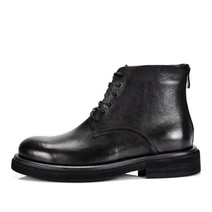 Side view profile of a classic black leather men's Martin boot with thick sole and lace-up front