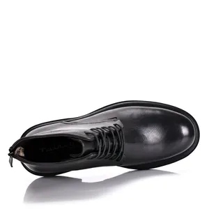 Top-down view of men's black leather Martin boots with lace-up and zipper detail.