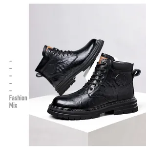 Detailed macro shot of vintage black leather men's Martin boots displayed on a white pedestal