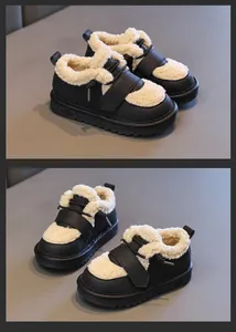 Detailansicht von gefütterten Kinder-Winterstiefeln in Schwarz und Creme-Farbe.