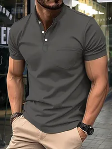 Men's slim fit dark grey muscle polo shirt featuring a stand collar and chest pocket