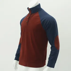 Detailed side view of men's corduroy raglan sleeve sweatshirt with stand collar and elbow patches