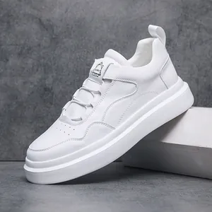 Classic white low-top casual slip-on sneakers for men with minimalist leather finish