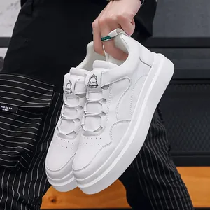 Modern men's minimalist white leather sneakers with slip-on elastic laces design