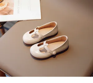 Beige round-toe Mary Jane shoes for toddler girls with non-slip sole and soft strap.