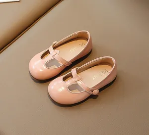 Close-up of pink Mary Jane shoes for girls with T-strap and MG BABY insole logo