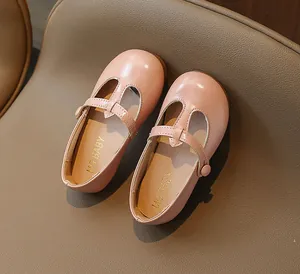 Close-up of pink Mary Jane toddler shoes featuring a round toe and classic T-strap