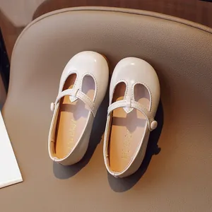 Classic cream Mary Jane leather shoes for toddler girls featuring a hook and loop strap