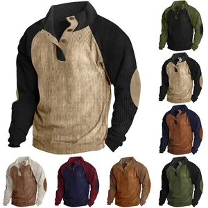 Macro view of various color-block corduroy sweatshirts with raglan sleeves and elbow patches.