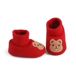 Red soft-sole baby winter sock shoes with cute cartoon bear embroidery detail