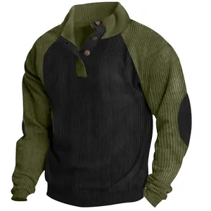 Detailed view of the corduroy texture and button collar on a men's color-block sweatshirt.