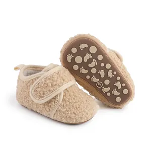 Detail view of winter thick fleece baby walking shoes with non-slip footprint sole