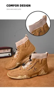 Detail view of men's mid-top boots featuring comfortable ribbed sock cuffs
