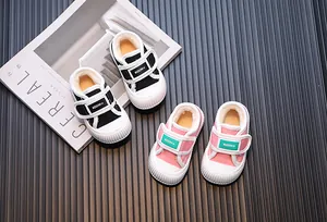 Winter fleece-lined toddler canvas shoes for boys and girls in pink and black colors