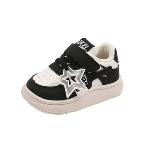 Cozy black and white winter warm kids sneakers with star charm and velcro strap