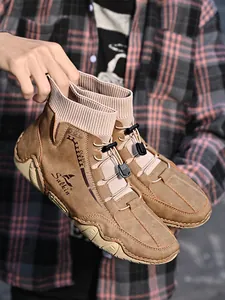 Brown octopus-style mid-top men's casual sock boots with elastic collar and toggle laces