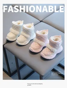 Warm toddler winter snow boots featuring plush faux fur trim and elegant quilted design