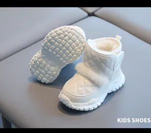 Cozy white quilted kids' snow boots featuring soft faux fur trim and a thick non-slip sole