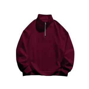 Detailed view of the stand collar and half-zip on this stylish maroon fleece sweatshirt