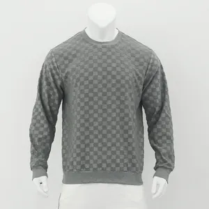 Close-up of the textured gray checkerboard pattern on a long-sleeved men's sweatshirt